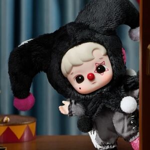 Whimsical Black and White Jester Doll with Pink Accents